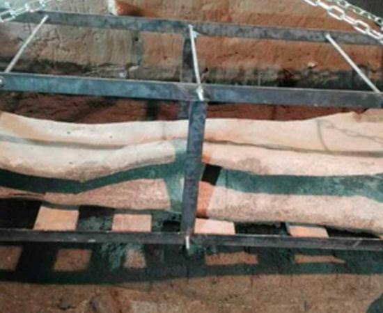 A photograph of a similar Roman-era lead coffin discovered in Spain in 2019. This is not the sarcophagus reported in this article, but is representational, based on its similar appearance. Source: Granada Hoy