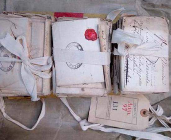 Three stacks of French love letters bound together by a ribbon, were finally opened by Cambridge University professor Renaud Morieux at the national archives, Kew. Source: The National Archives / Renaud Morieux