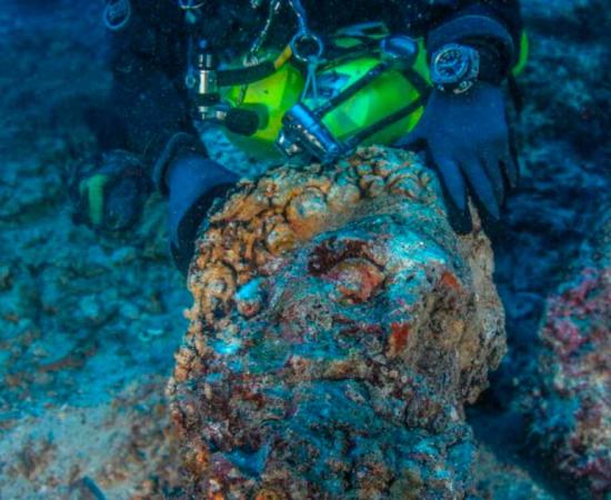 This marble head, believed to be the head of Hercules, was found next to the legendary Antikythera shipwreck. It may complete a headless statue found on the wreck in 1900 that is now on display in Athens’ largest museum. Source: Ministry of Culture and Sports