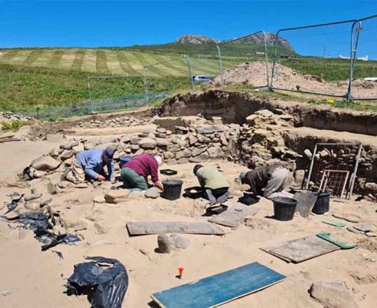 A new find on this day of digging at the medieval Wales site on Whitesands Bay, Pembrokeshire was a clay furnace which was removed from next to the ancient chapel wall (St. Patrick’s Chapel).	