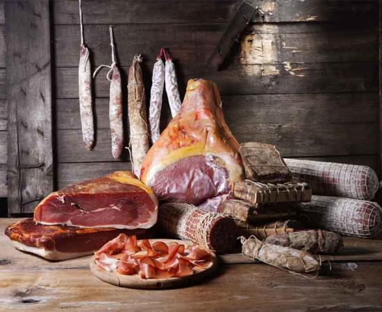 Pork hams and sausages. Based on the latest research study of food remnants in Islamic Sicily from medieval cooking pots we now know that the urban Muslims did not eat pork, but that rural people under their rule did. (April D / Adobe Stock)