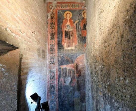 The well-preserved, brightly colored fresco of Saint Alexis and Christ the Pilgrim. Source: ABC