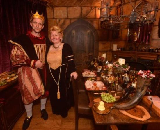 Jayne and Martin Townley at their Middle Ages themed house hosting a medieval banquet