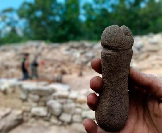 Archaeologists uncovered a medieval stone phallus they believe may have been used to sharpen weapons. Source: Árbore Arqueoloxía S.Coop.Galega