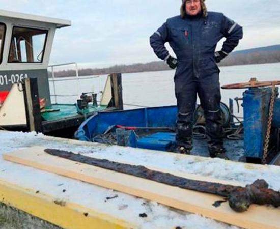The medieval sword after it was dredged out of the Vistula River at Włocławekport, Poland.	Source: Provincial Office for the Protection of Monuments In Torun 