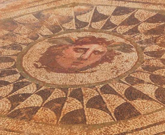 2nd century mosaic of a winged medusa head found in Roman-era house in Spain. (Image credit: Mérida City Hall)