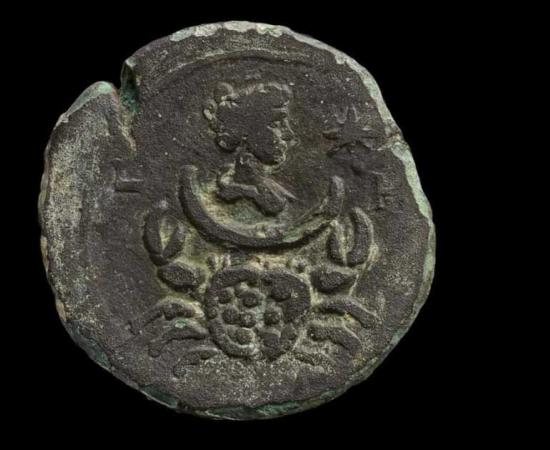 A 1,800-year-old Roman coin portraying the goddess Luna was recovered from the Israeli Mediterranean. Source: Dafna Gazit / Israel Antiquities Authority
