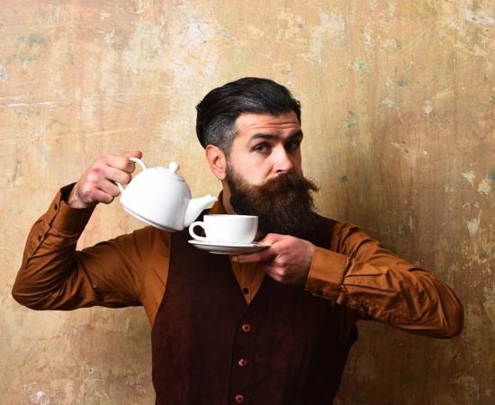 A gentleman and a moustache cup. Source: be free / Adobe Stock