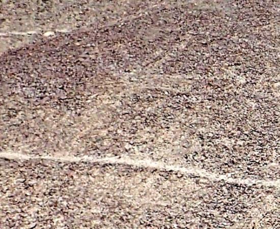 A photo of an ancient geoglyph in the shape of a llama found by Yamagata University researchers on the Nazca Plateau in Peru.