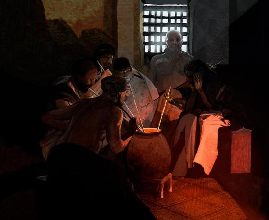 Recreation of the oldest drinking straws, found at the Maikop burial, in use. Source: Kevin Wilson / Antiquity Publications Ltd