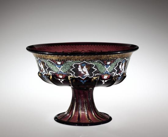 This piece of glass, a footed bowl, was blown about 1500 in Venice and enameled in the late 19th century in France.