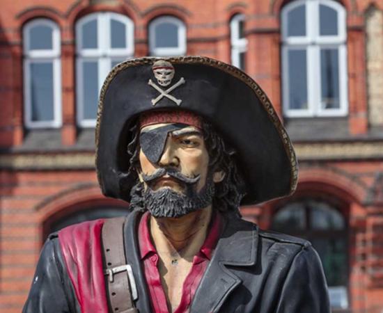 Statue of pirate with eyepatch.