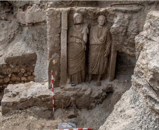Funerary monument featuring two life-sized statues found at Porta Sarno necropolis, Pompeii.