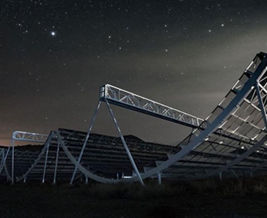The CHIME telescope looking up at the night sky. The Canadian telescope has captured new bizarre radio signals from 1.5 billion light years away.