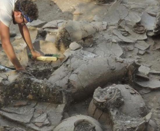 Archaeologists say they can piece together these wine jars, which are in excellent condition compared to other ceramic artifacts from ancient times. (Photo by Eric Cline)