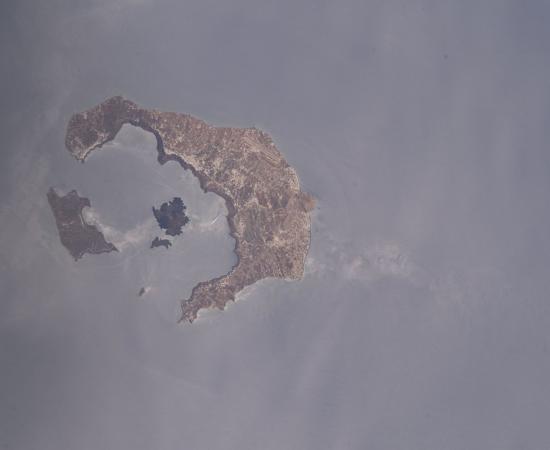 The ring-shaped islands of Santorini around its flooded volcanic caldera, photographed from the International Space Station