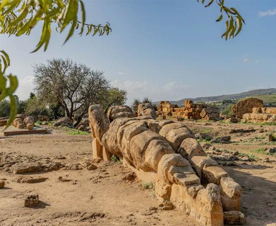 Titan Atlas statue found amongst the Greek temples of Agrigento.     Source: Wead / Adobe Stock