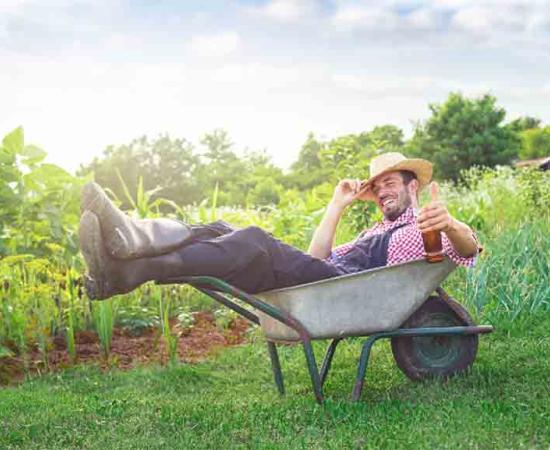 A  Farmer with a drink. 
