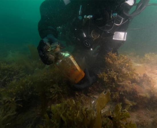 A Parks Canada underwater archeologist works about eight meters (26.25 ft.) below the surface of the water. Source: Underwater archeology team/Parks Canada