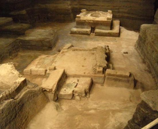 Archaeologists have unearthed 12 buildings, including a house (left), storehouse (center) and community sauna (upper right) buried by volcanic ash at Ceren around A.D. 660. 