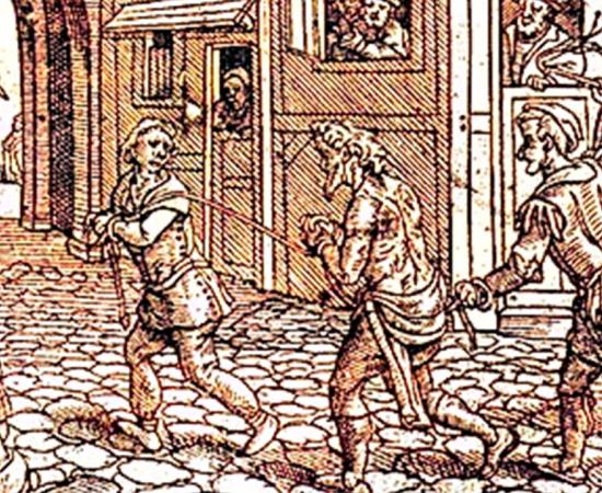 Woodcut depicting a vagrant being punished in the streets of Tudor England. Source: Public domain