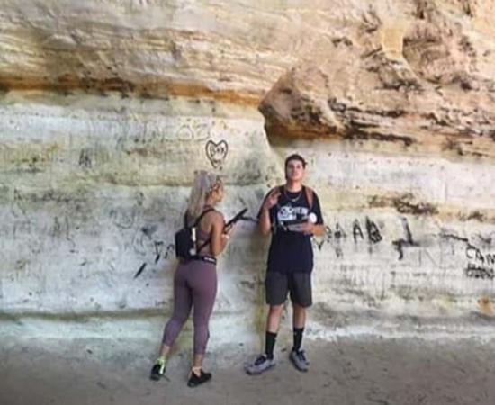 Pictures posted on online of the vandals who damaged the Council Overhang cavern in Starved Rock Park in Illinois over the Labor Day holiday. Source: Daily Mail / Fair Use.