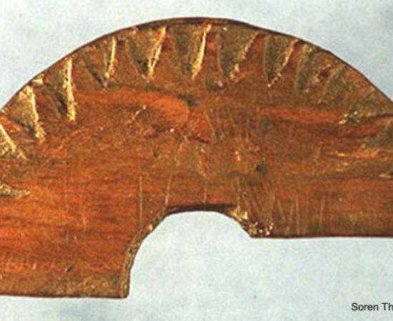 Wooden fragment discovered in Uunartoq, Greenland, in 1948, which is believed to be a sun-compass used to determine direction