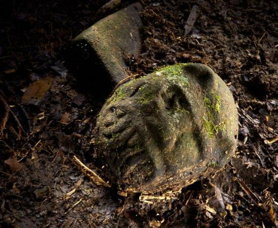 A “were-jaguar” effigy, likely representing a combination of a human and spirit animal, is part of a still-buried ceremonial seat, discovered in a cache in ruins deep in the Honduran jungle. 