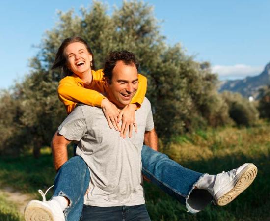 Wife-carrying. Source: Алина Битта / Adobe Stock.