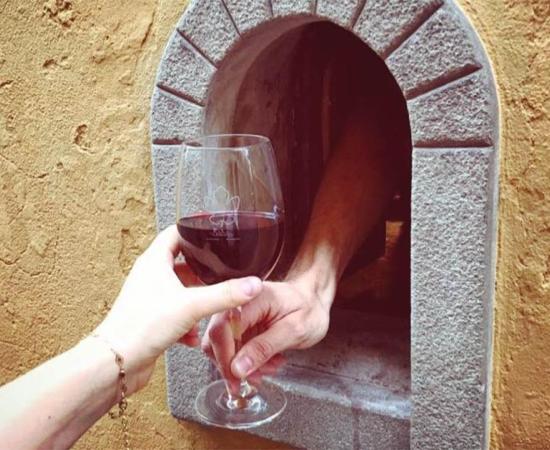 Florence’s historic ‘wine windows’ have reopened in response to COVID-19                 Source: Buchette Del Vino