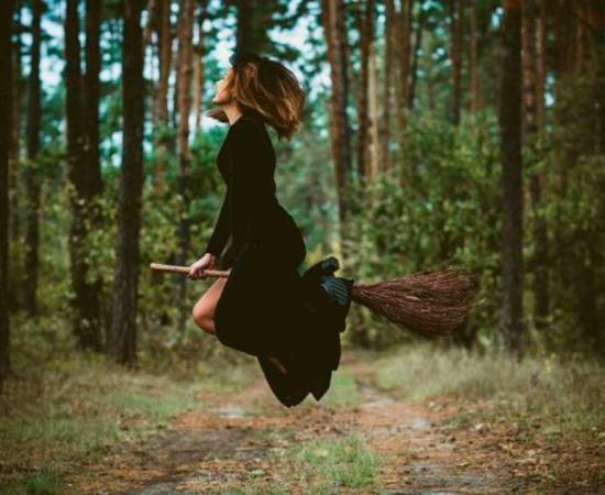 Witch on a broomstick. Source:  T.Den_Team / Adobe Stock