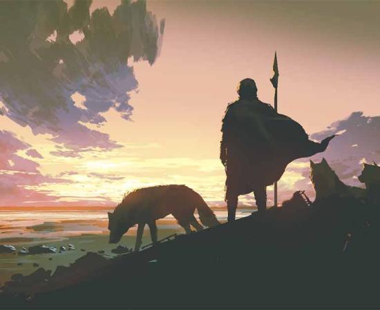 Stone Age man with pet wolves. Source: grandfailure / Adobe Stock.