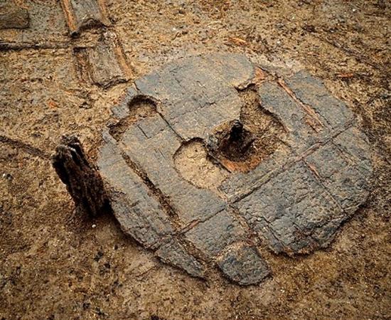 The wooden wheel unearthed at Must Farm.