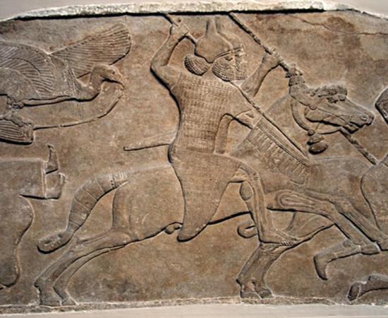 Assyrian relief of a horseman from Nimrud, now in the British Museum. "Battle scene, Assyrian, about 728 BC.