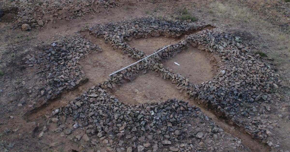 The remains of a kurgan burial mound found in Kazakhstan with two stone ridges known as "mustaches." 