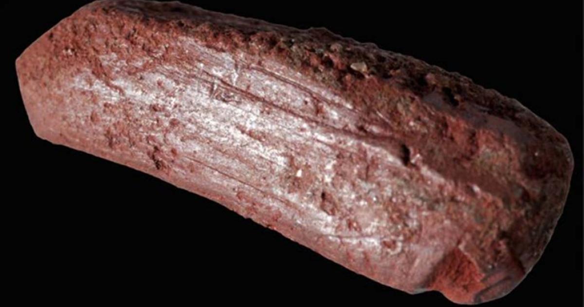 An ochre crayon thought to have been used to draw on animal skins 10,000 years ago. 