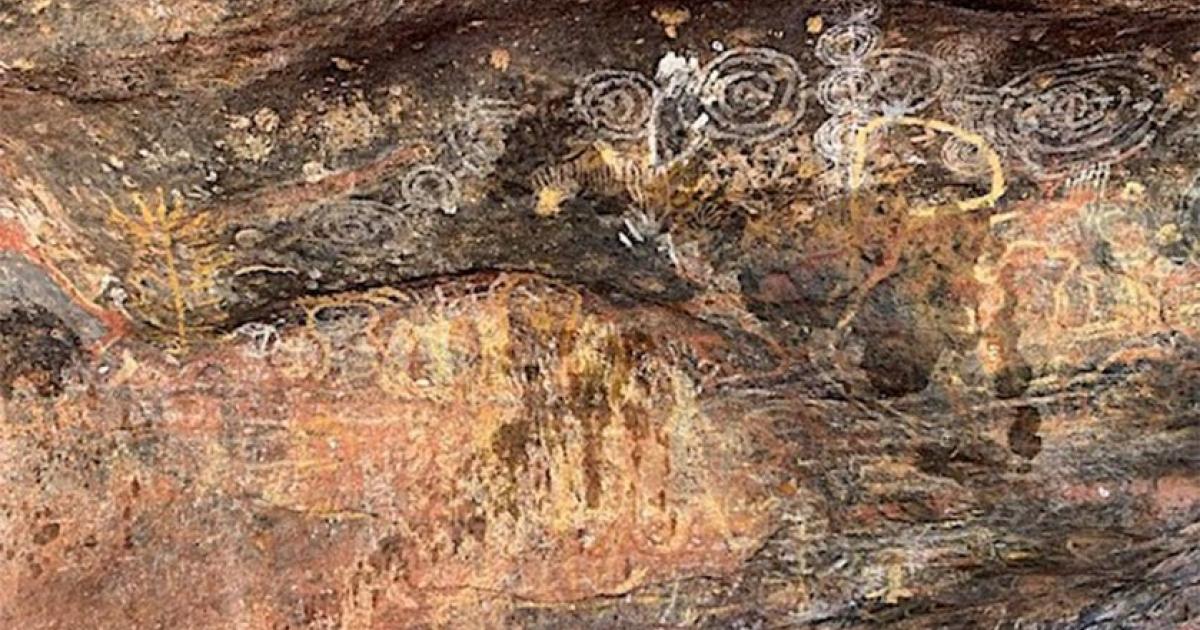 The Aboriginal rock art of Uluru that has been damaged, with stains of a dark fluid that can clearly be seen. Source: Emma Haskin / ABC