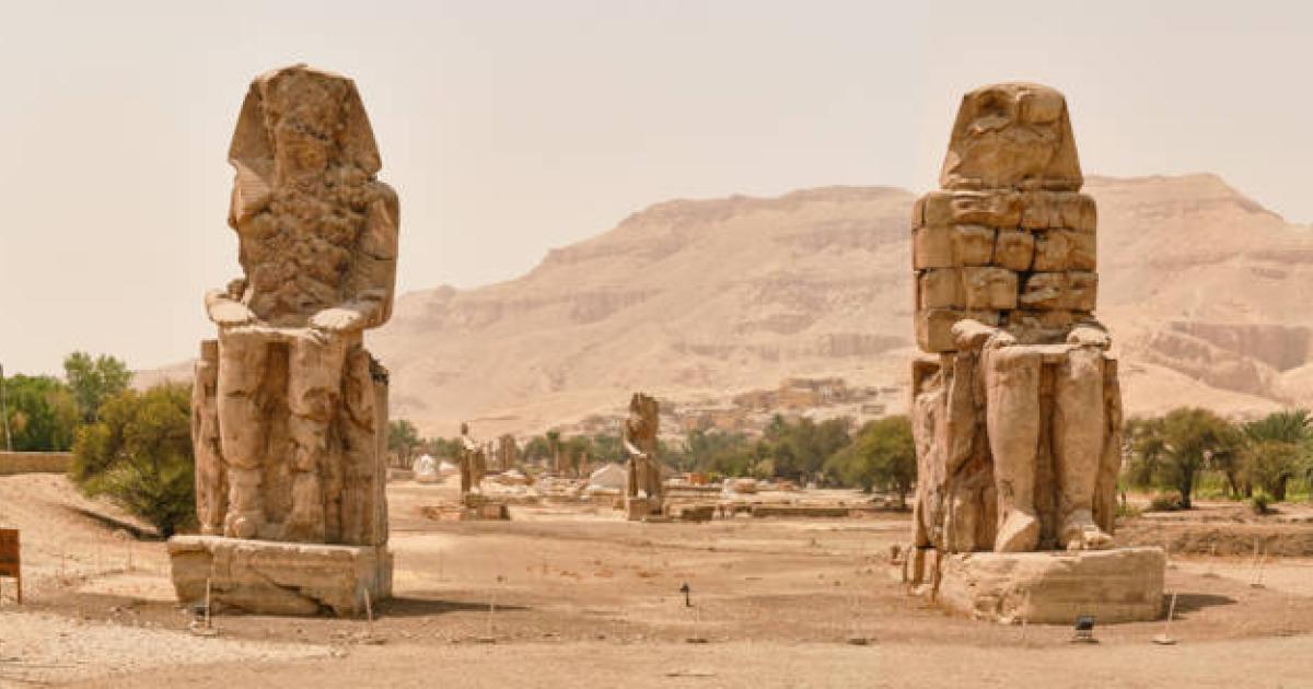 Colossi of Memnon (statues of Pharaoh Amenhotep III), Luxor, Egypt.  