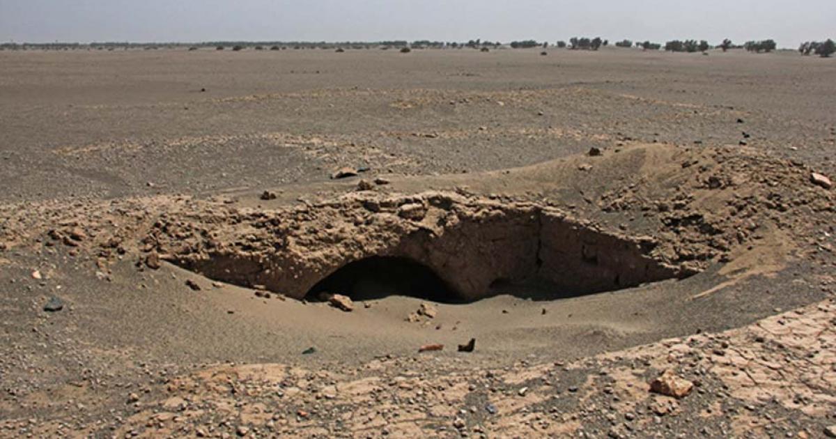 The site consists of structures that archaeologists are examining and excavating to determine whether they are of a necropolis or a settlement. The structures are adobe.