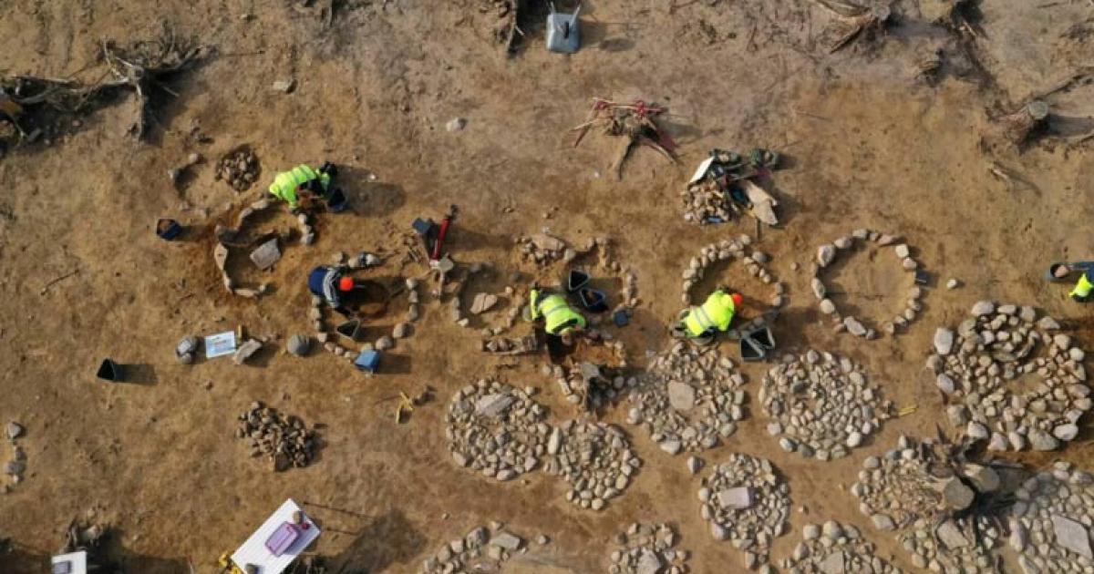Archaeologists at work in a large burial field in southeastern Norway, where 40 circular stone formations with cremated bone remains, mostly from children, were found placed in the middle.		Source: Museum of Cultural History/Science Norway