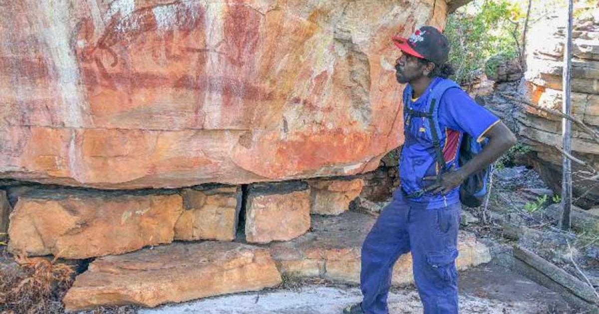 Young Dakal clan landowner Desmond Lindsay visits a Wilton River Australian rock art site for the first time. Most sites are remote and often impossible to approach in a vehicle. Source: Mimal Land Management Aboriginal Corporation (MLMAC) / Flinders University  By