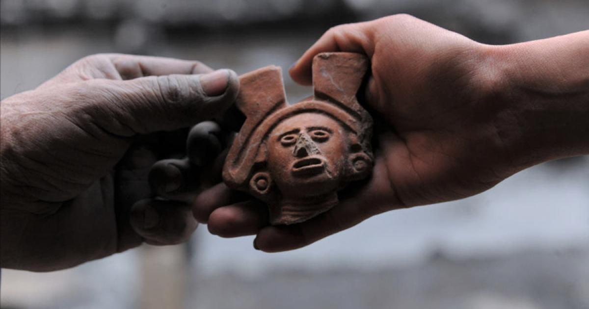 Figurine head found at the Aztec altar site at Garibaldi Plaza, Mexico City, which is a representation of the Aztec goddess Cihuacóatl.		Source: Mauricio Marat / INAH