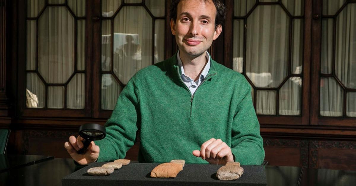 Dr. Martin Worthington, who was hired to attain authenticity in Marvel’s Eternals, in the Library of Trinity College Dublin pictured with a collection of cuneiform tablets written in ancient Babylonian language. Source: Trinity College Dublin