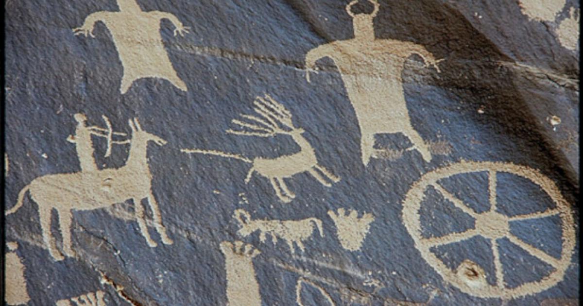 A petroglyph from Newspaper Rock, Utah, showing hunting with a bow and arrow.