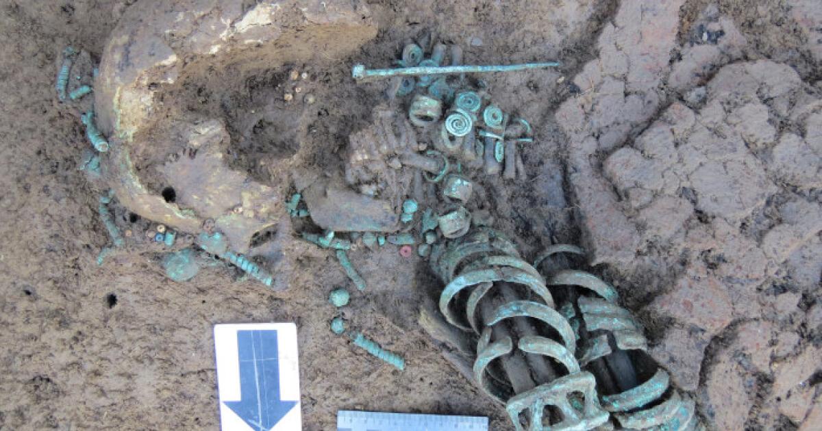 The striking remains of the woman buried with 19 bronze bracelets and 8 rings on her hands