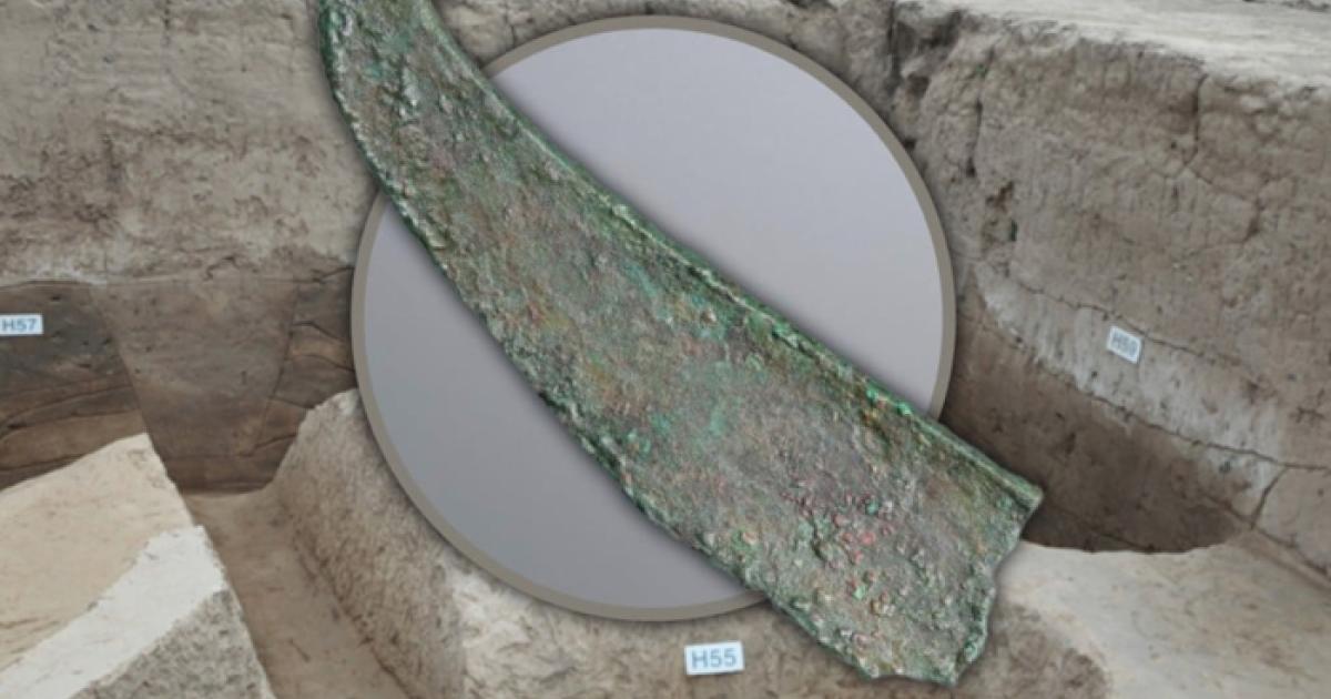 A broken bronze dagger-axe from the Jiangliu burial site, Shaanxi Province, with background of the excavation.