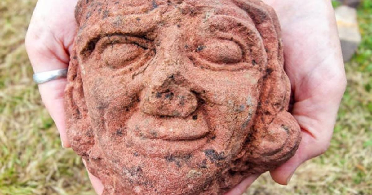 An intricately carved medieval sandstone head discovered during archaeological excavations at Skaill Farm on the island of Rousay, Orkney