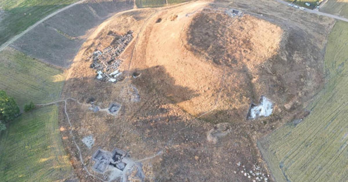 Aerial view of Uşaklı Höyük archaeological excavation showing large mound