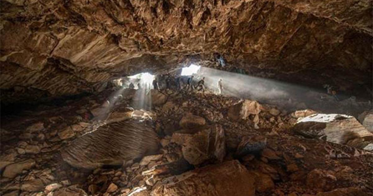 Team members entering the Chiquihuite cave, where the purported prehistoric manmade artifacts were found, which a recent study has claimed were naturally produced.		Source: Devlin A. Gandy