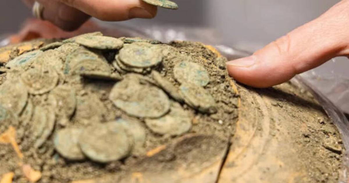 Vessel of Roman coins found in France.